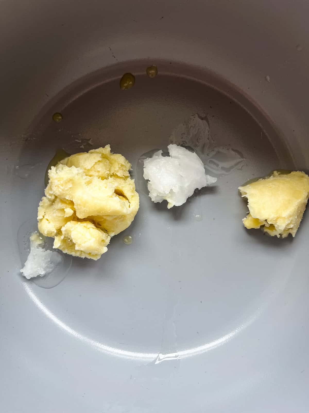 DIY diaper cream ingredients in a pot to melt. 