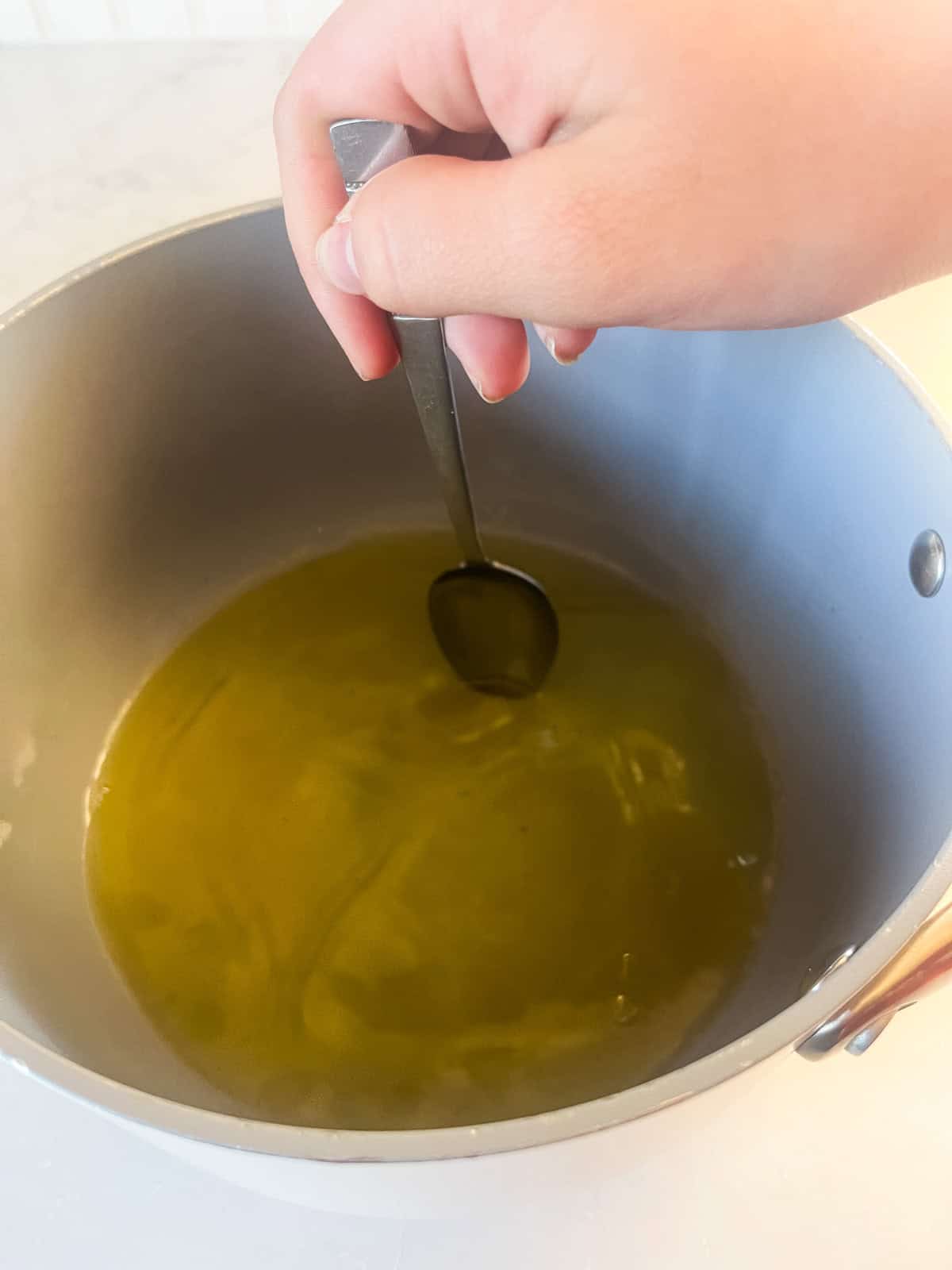 Melting the fats in a saucepan. 