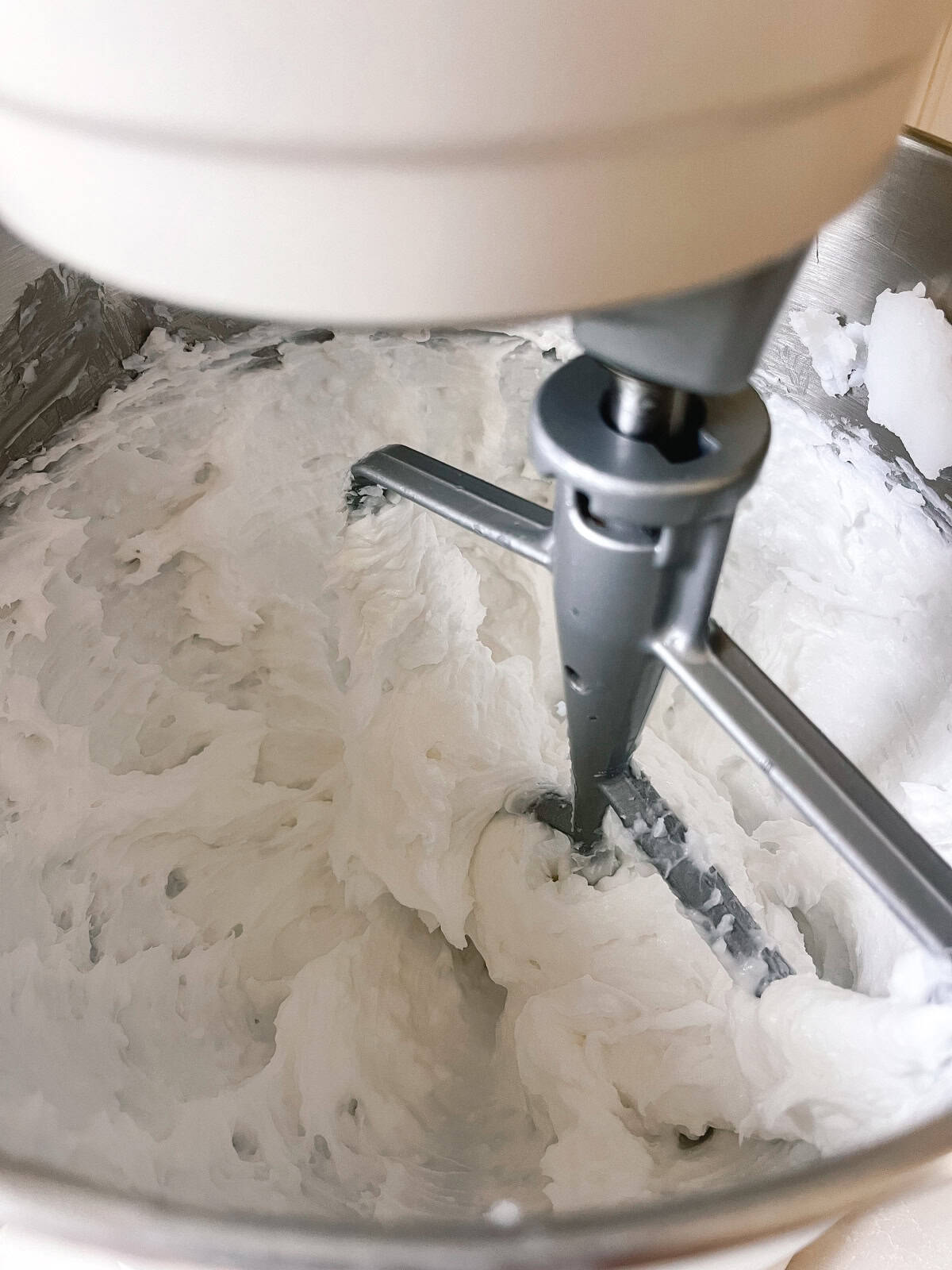 Whipping soap base in a stand mixer.